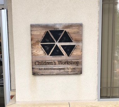 Custom wooden sign for children's workshop