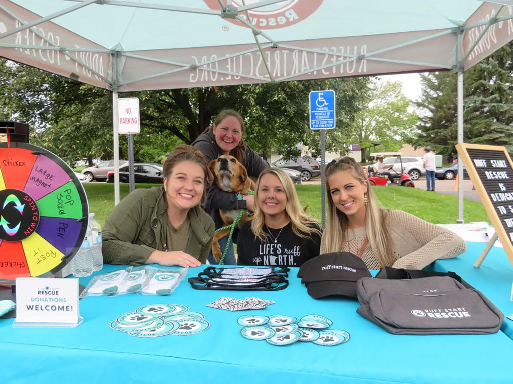 The Ruff Start Rescue team at their booth during SOULO's 25th Anniversary Event.