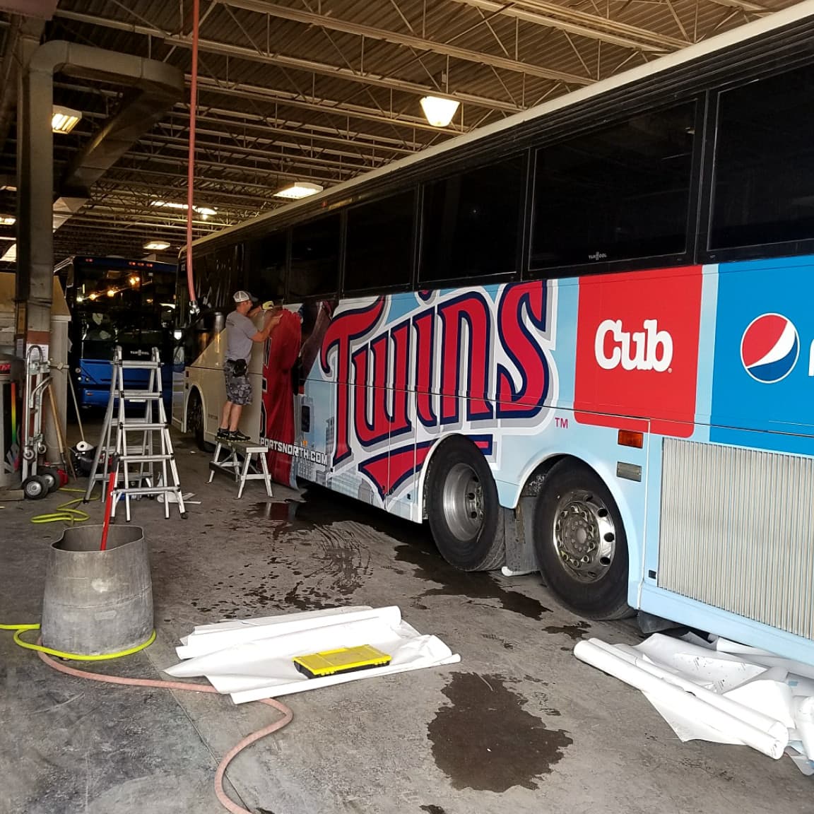 Twins Bus Wrap with a Pepsi Ad and a cub Foods Ad