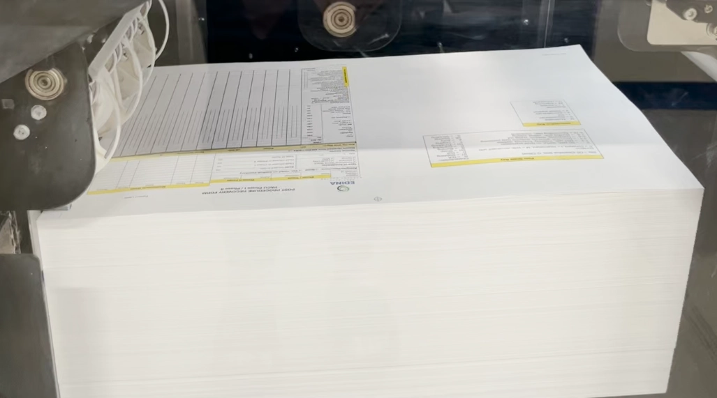 Image of forms being printed on one of SOULO's Printers