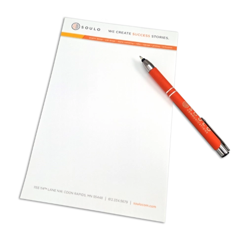 image of a SOULO branded notepad with pen