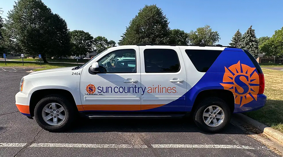 Vehicle Wrap: Sun Country Airlines Van Wrap by SOULO